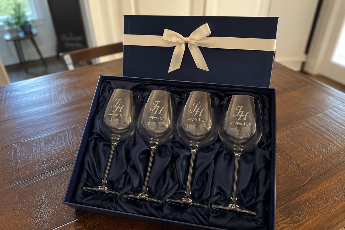 Etched wine glasses in a tasting room